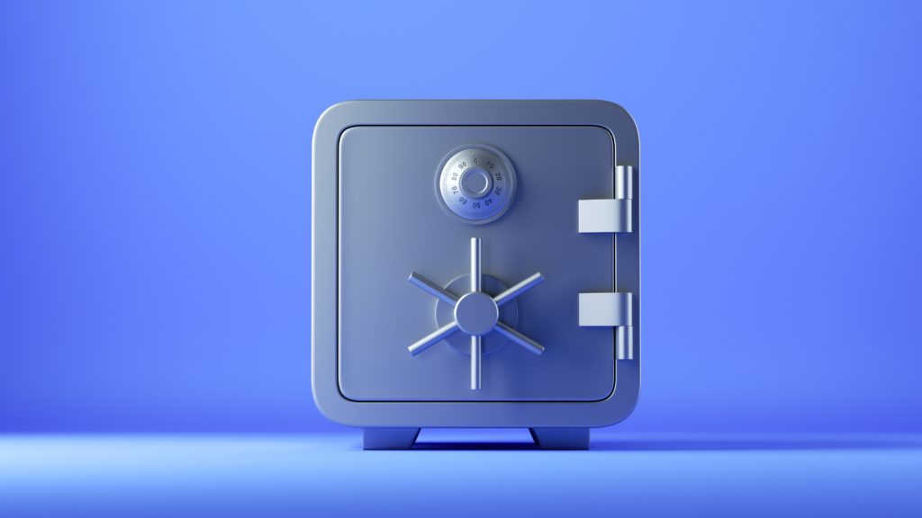 3d render, closed metallic safe box isolated on blue background.