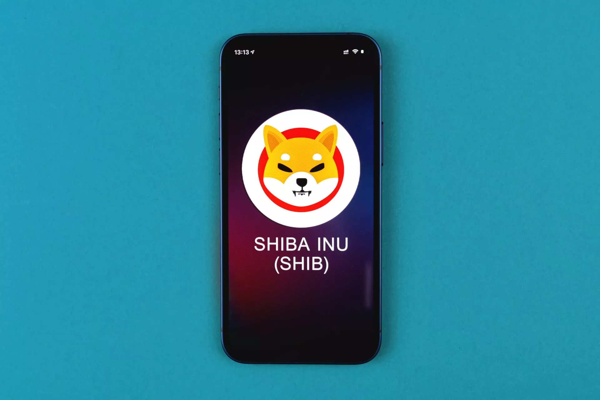 SHIBA INU symbol. Trade with cryptocurrency, digital and virtual money, banking with mobile phone concept. Business workspace, table top view photo
