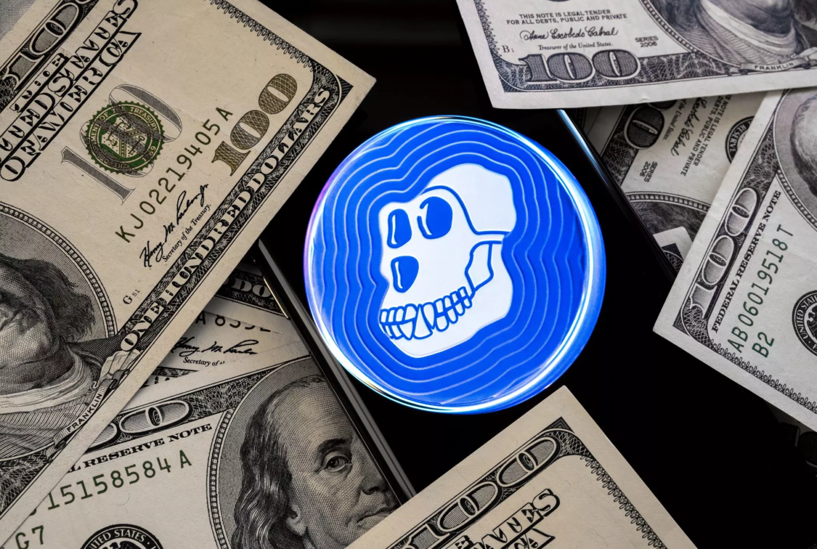 ApeCoin crypto token logo seen on the smartphone which is placed