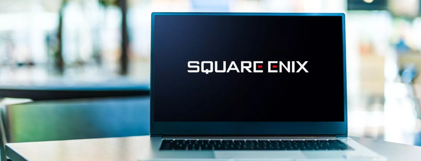 Square Enix Logo on Laptop