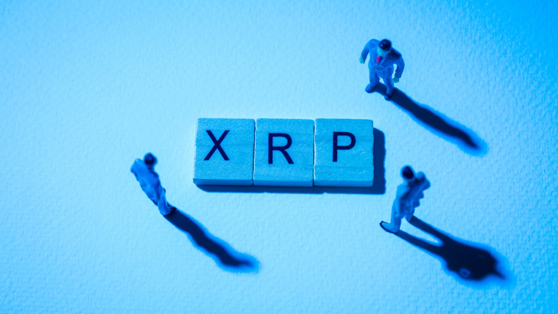 blue businessman at XRP words